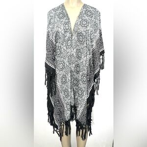 Steve Madden ruana is stylish in a fun bandana print.